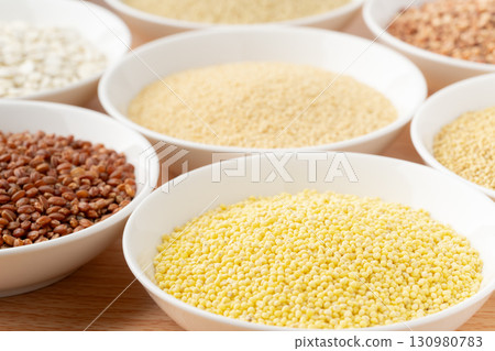 Various types of grains arranged on a plate Various types of grains arranged on a plate 130980783