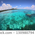 Summer scenery, cumulonimbus clouds and emerald green sea 130980794