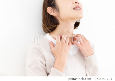 Middle-aged woman suffering from body itching 130980795