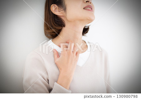 Middle-aged woman suffering from body itching 130980798
