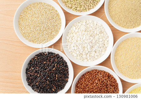 Various types of grains arranged on a plate 130981006