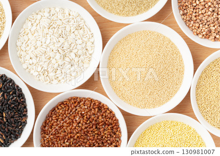 Various types of grains arranged on a plate 130981007