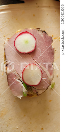 Delightfully OpenFaced Sandwich featuring Fresh Radishes and Savory Ham to Enjoy Delightfully OpenFaced Sandwich featuring Fresh Radishes and Savory Ham to Enjoy 130981066