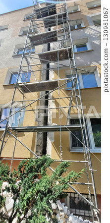 Construction Scaffolding Set Up on Building Facade for Important Renovation Work In Progress 130981067