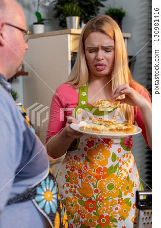 Experiencing a Culinary Disappointment in the Kitchen During a Creative Cooking Session Experiencing a Culinary Disappointment in the Kitchen During a Creative Cooking Session 130981416