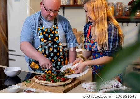 Cooking Together An Exciting and Enjoyable Culinary Experience Right in the Kitchen Cooking Together An Exciting and Enjoyable Culinary Experience Right in the Kitchen 130981545
