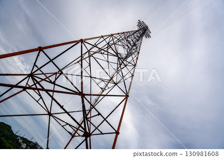 Vladivostok shows a tall communication tower against a cloudy sky Vladivostok shows a tall communication tower against a cloudy sky 130981608