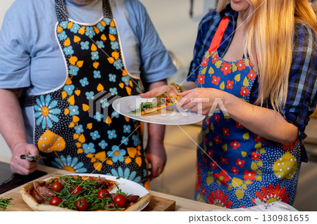 Cooking Together A Fun Culinary Experience That Brings People Closer While Preparing Meals Cooking Together A Fun Culinary Experience That Brings People Closer While Preparing Meals 130981655
