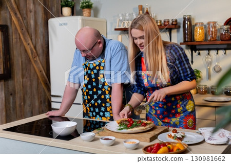 Cooking Together A Delightful and Enjoyable Culinary Experience to Share in the Kitchen Cooking Together A Delightful and Enjoyable Culinary Experience to Share in the Kitchen 130981662