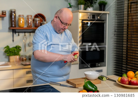 Carefully Preparing Fresh and Quality Ingredients in a Modern Kitchen Setting Environment Carefully Preparing Fresh and Quality Ingredients in a Modern Kitchen Setting Environment 130981685