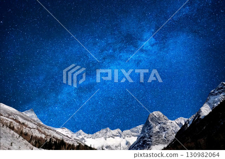 star trails in the mountains snow falling in the mountains star trails in the mountains snow falling in the mountains 130982064