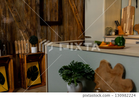A beautifully designed Modern Rustic Kitchen Interior featuring Fresh Ingredients and decor 130982224