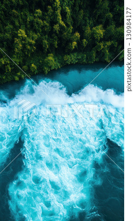 A hydroelectric dam generating power from a flowing river 130984177