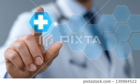 Doctor Touching Digital Health Icon With Blue Cross Symbol 130984522