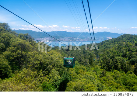 Miyajima ropeway above Mount Misen on Miyajimaa Island, Hiroshima Miyajima ropeway above Mount Misen on Miyajimaa Island, Hiroshima 130984872