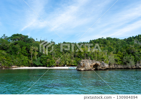 Pirogue on Lia beach, Waleakodi Island, Togian archipelago, Sulawesi, Indonesia 130984894
