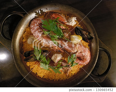 Paella at a Spanish restaurant 130985452