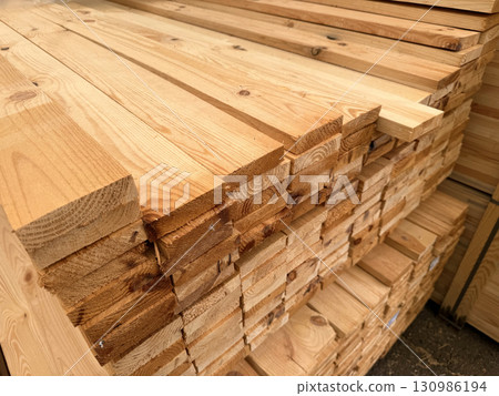 Wooden planks in a hardware store warehouse Wooden planks in a hardware store warehouse 130986194