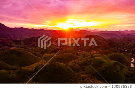 Drone aerial view of landscape mountains view in sunrise or sunset time,High angle view over countryside at northern Vietnam 130986558