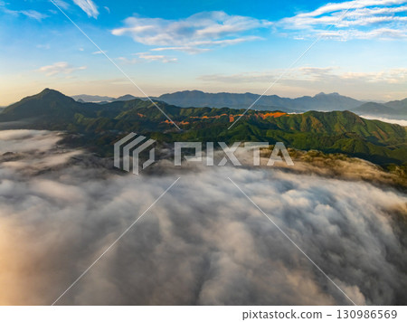 Drone aerial view of landscape mountains view in sunrise or sunset time,High angle view over countryside at northern Vietnam Drone aerial view of landscape mountains view in sunrise or sunset time,High angle view over countryside at northern Vietnam 130986569