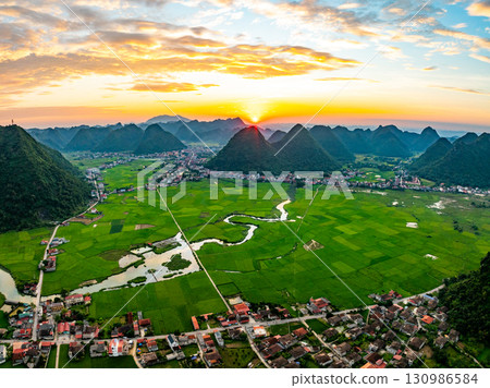 Drone aerial view of landscape mountains view in sunrise or sunset time,High angle view over countryside at northern Vietnam 130986584
