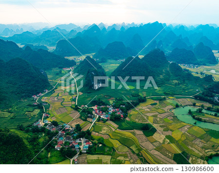 Drone aerial view of landscape mountains view in sunrise or sunset time,High angle view over countryside at northern Vietnam 130986600
