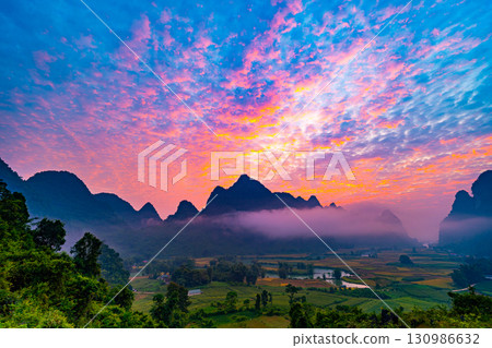 Drone aerial view of landscape mountains view in sunrise or sunset time,High angle view over countryside at northern Vietnam 130986632