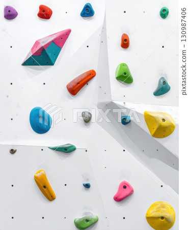 [AI image] A white bouldering wall with colorful holds 130987406
