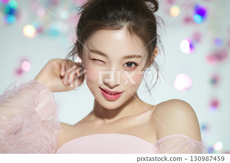Portrait of a winking beautiful model (advertising, beauty, fashion) 130987459
