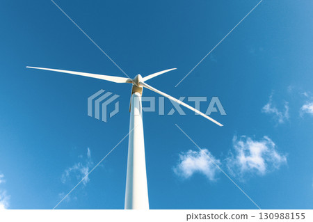 Wind turbine against clear blue sky in Andalusia Wind turbine against clear blue sky in Andalusia 130988155
