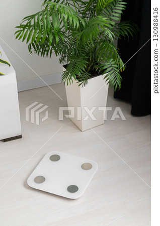 A Modern Bathroom Scale Featured in a Contemporary and Stylish Setting for Your Home Decor 130988416