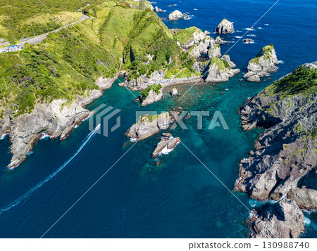Aerial photography is being carried out to survey Hirizo Beach and the surrounding islands and sea areas. The drone was flown with permission from the local fishing association. 130988740