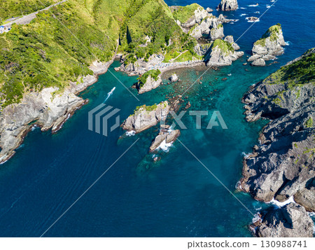 Aerial photography is being carried out to survey Hirizo Beach and the surrounding islands and sea areas. The drone was flown with permission from the local fishing association. Aerial photography is being carried out to survey Hirizo Beach and the surrounding islands and sea areas. The drone was flown with permission from the local fishing association. 130988741