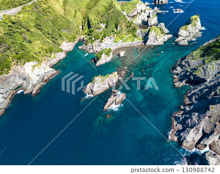 Aerial photography is being carried out to survey Hirizo Beach and the surrounding islands and sea areas. The drone was flown with permission from the local fishing association. Aerial photography is being carried out to survey Hirizo Beach and the surrounding islands and sea areas. The drone was flown with permission from the local fishing association. 130988742