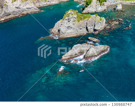 Aerial photography is being carried out to survey Hirizo Beach and the surrounding islands and sea areas. The drone was flown with permission from the local fishing association. 130988747