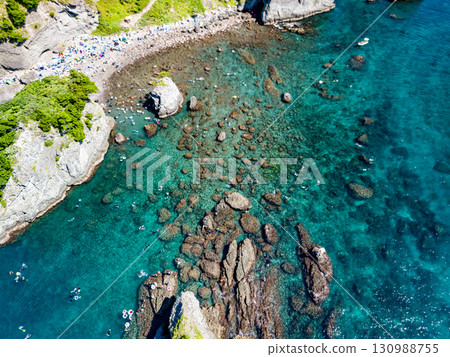 Aerial photography is being carried out to survey Hirizo Beach and the surrounding islands and sea areas. The drone was flown with permission from the local fishing association. Aerial photography is being carried out to survey Hirizo Beach and the surrounding islands and sea areas. The drone was flown with permission from the local fishing association. 130988755