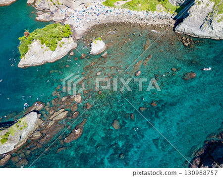 Aerial photography is being carried out to survey Hirizo Beach and the surrounding islands and sea areas. The drone was flown with permission from the local fishing association. Aerial photography is being carried out to survey Hirizo Beach and the surrounding islands and sea areas. The drone was flown with permission from the local fishing association. 130988757