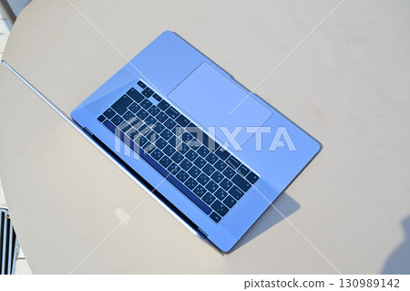 Laptop on table Laptop on table 130989142