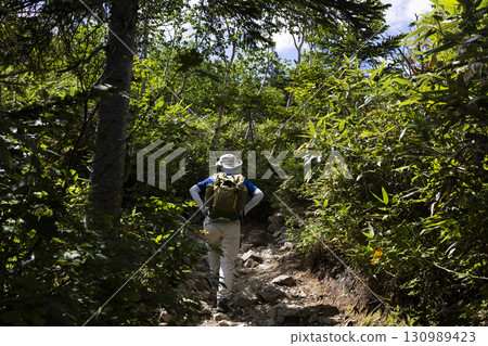 Middle women climbing mountains Middle women climbing mountains 130989423