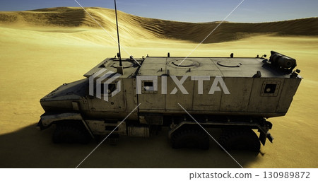 A sturdy off road vehicle navigates through vast sandy dunes, casting a long shadow in the midday sun. The landscape is arid and sun drenched, with soft waves in the sand. 130989872