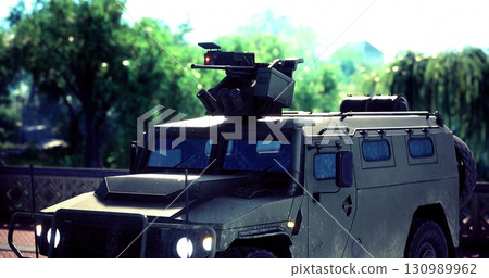 Strategically positioned in a vibrant landscape, the armored vehicle showcases cutting edge technology. The sun shines brightly, highlighting its impressive design amidst natural surroundings. 130989962