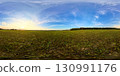 360 HDRI image of a scenic countryside field at sunset, with dramatic sky and distant treeline. Ideal for nature renders, VR environments, and landscape visualizations. 130991176