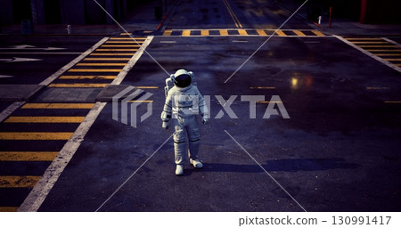 An astronaut in a white space suit walks along a deserted urban street at night. Streetlights illuminate the surroundings, creating a surreal atmosphere amidst the city. An astronaut in a white space suit walks along a deserted urban street at night. Streetlights illuminate the surroundings, creating a surreal atmosphere amidst the city. 130991417