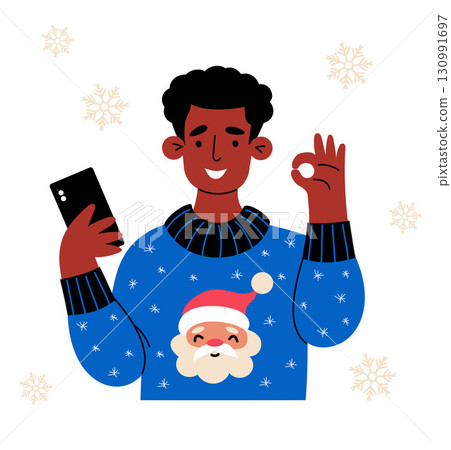 Happy Ethnic Man in Christmas Sweater with Santa and Phone in Hand. New Year Joyful Male Character with Hand Gesture Ok. Vector Illustration. Not AI 130991697