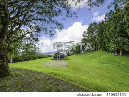 beautiful landscape of a green lawn in a park beautiful landscape of a green lawn in a park 130992163