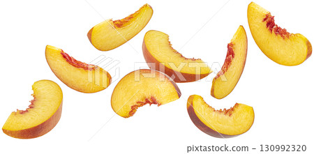Falling peach slices isolated on white background with clipping path, falling fresh nectarine pieces Falling peach slices isolated on white background with clipping path, falling fresh nectarine pieces 130992320