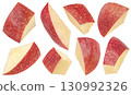 Falling apple slices isolated on white background with clipping path, full depth of field 130992326