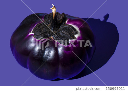 Eggplant Pumpkin shaped shadow on a purple background. Vegetable violet food top view Eggplant Pumpkin shaped shadow on a purple background. Vegetable violet food top view 130993011