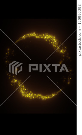 Glowing golden particle ring on a dark background, resembling an energy portal or cosmic circle 130993398