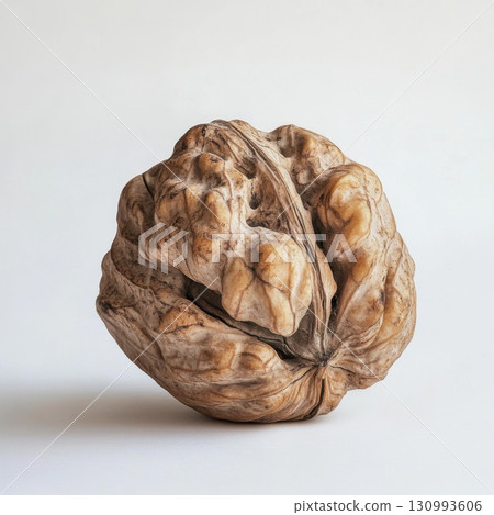 Close-up of a walnut shell on white background 130993606